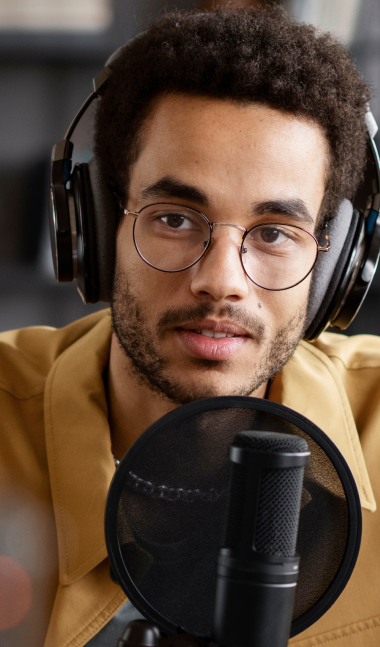 young-man-recording-podcast-medium-shot